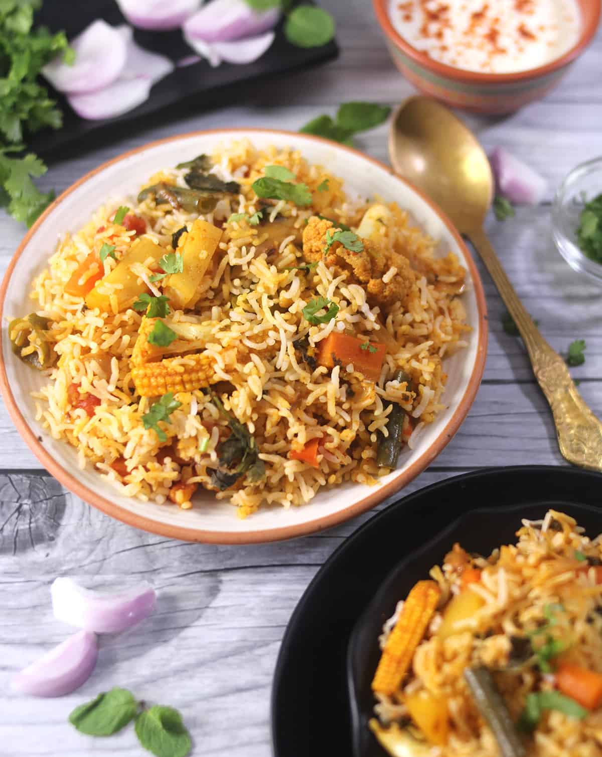 Best, simple and easy vegetable biryani (veg biryani) served with raita. 