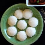 soft & fluffy idli on a serving plate.