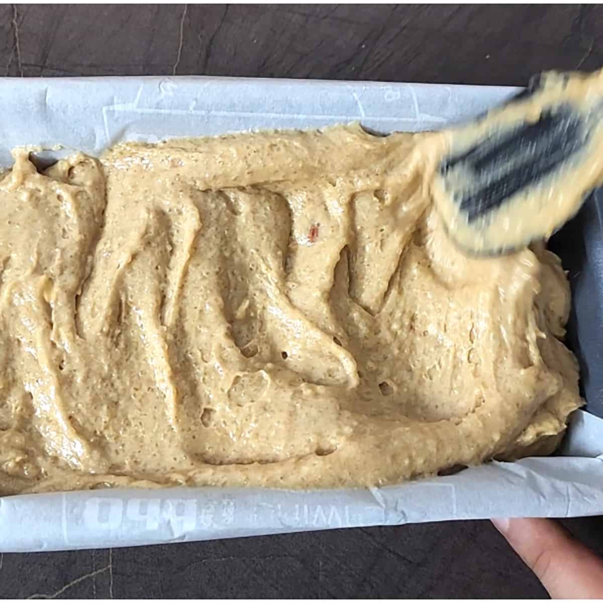 Pour the batter into baking pan. 