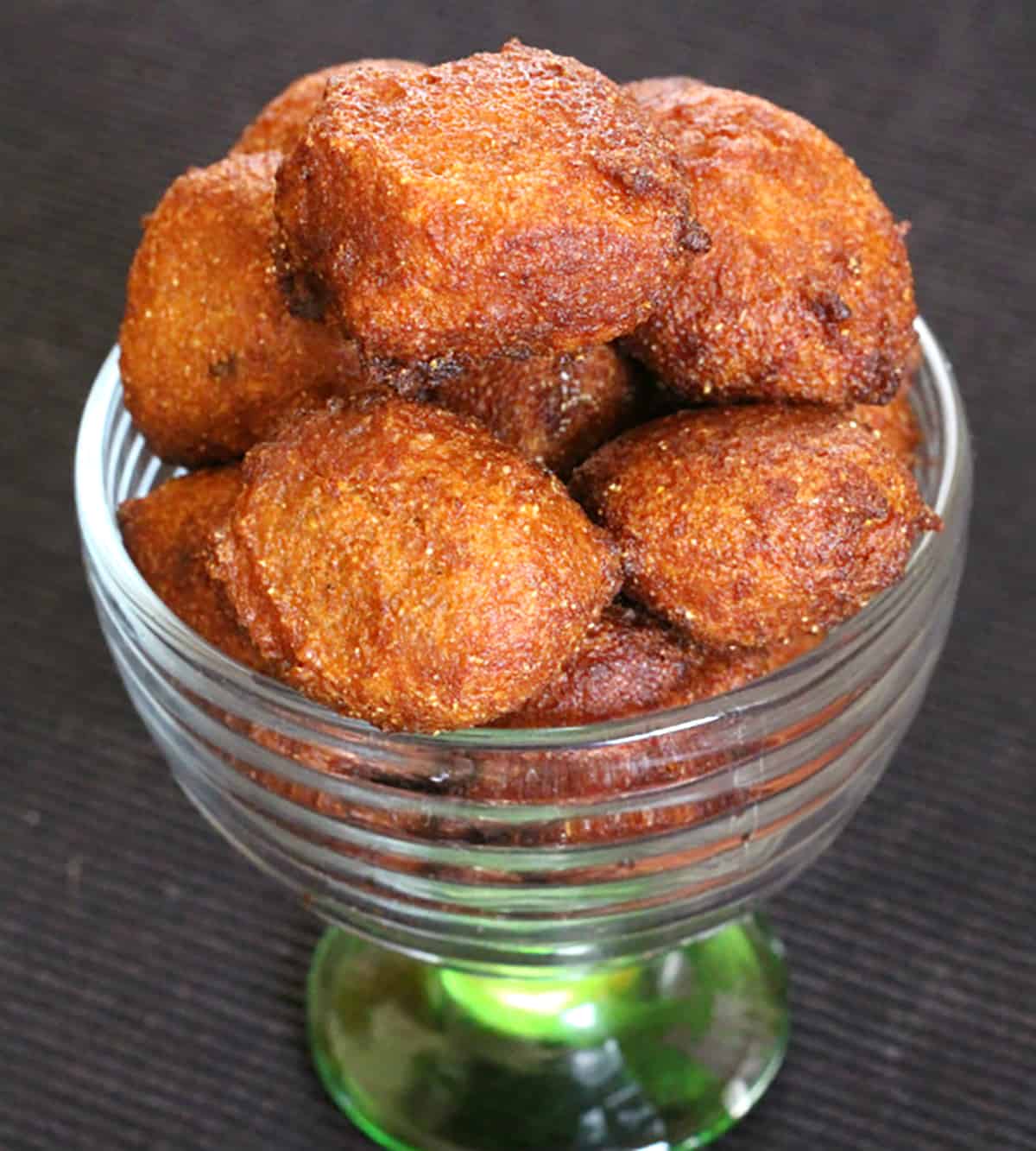 Authentic fried modak recipe with banana, wheat flour, coconut, jaggery, ghee. Konkani modak.