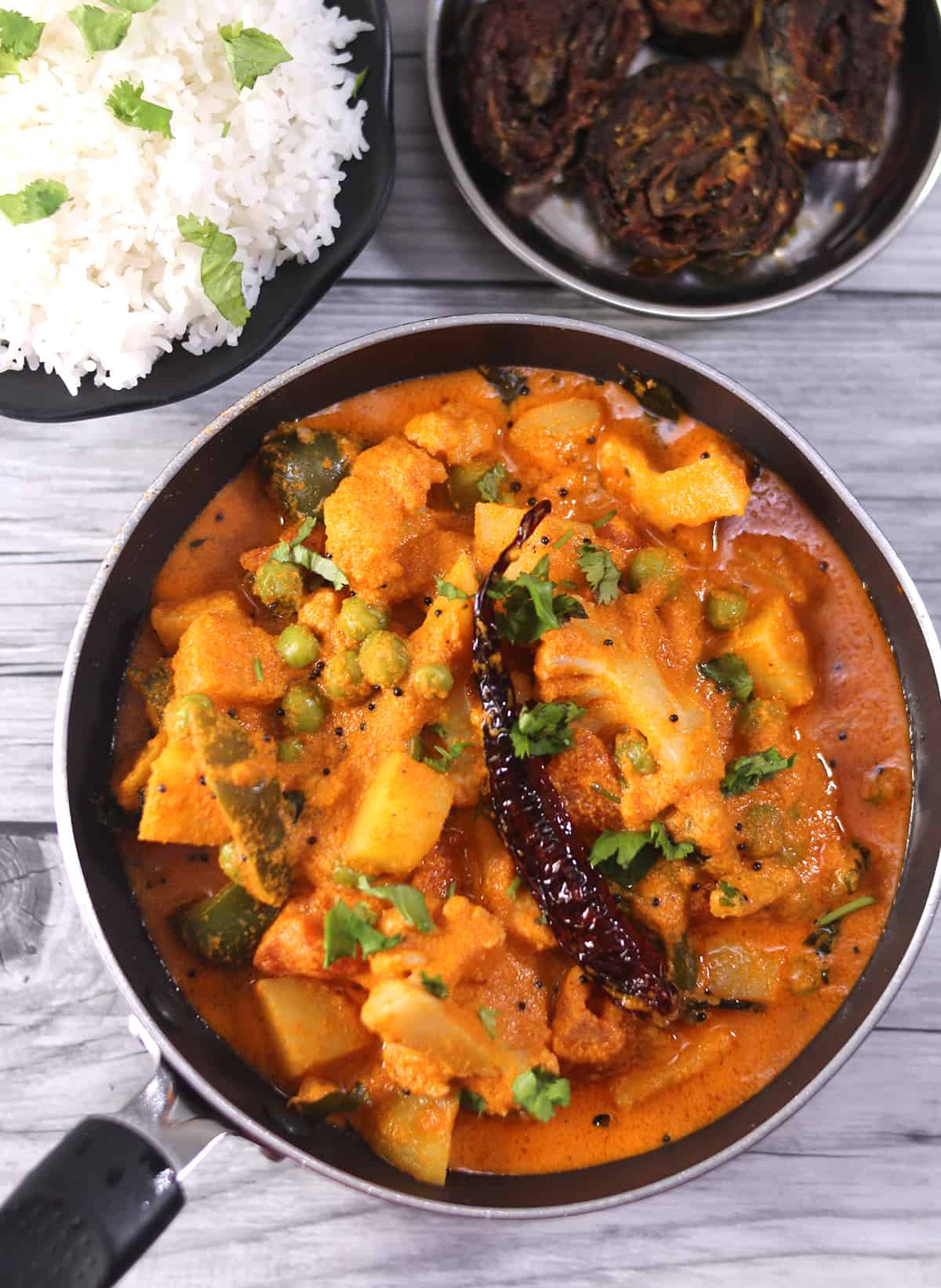 Spicy potato curry - best vegetarian Indian recipe with mixed vegetables for lunch and dinner. 