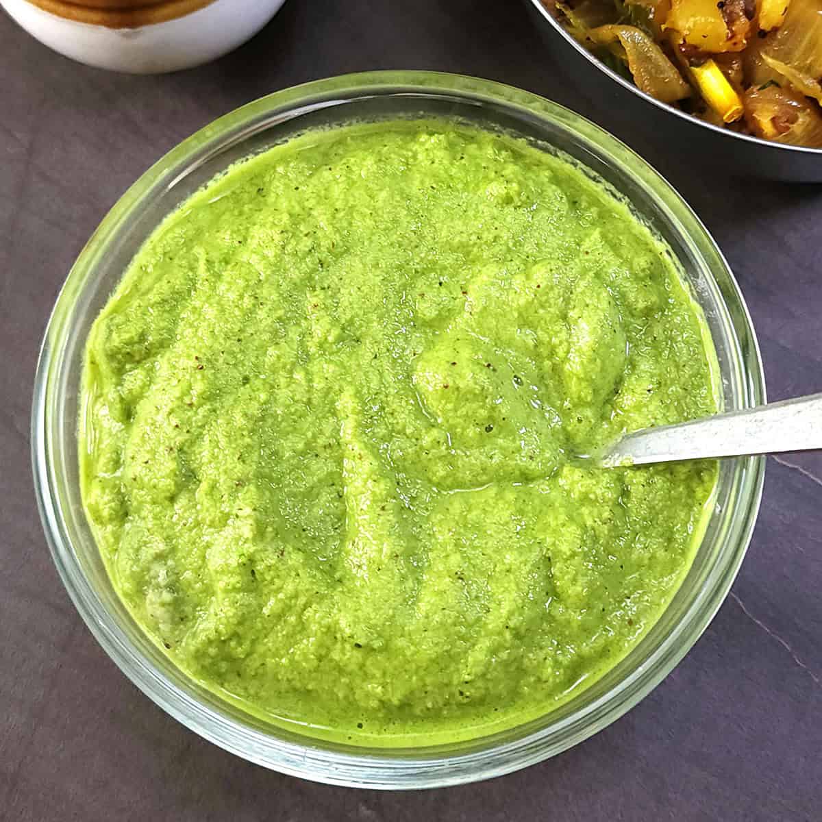 Easy coconut cilantro chutney or green chutney with chili, coriander for breakfast and snacks.