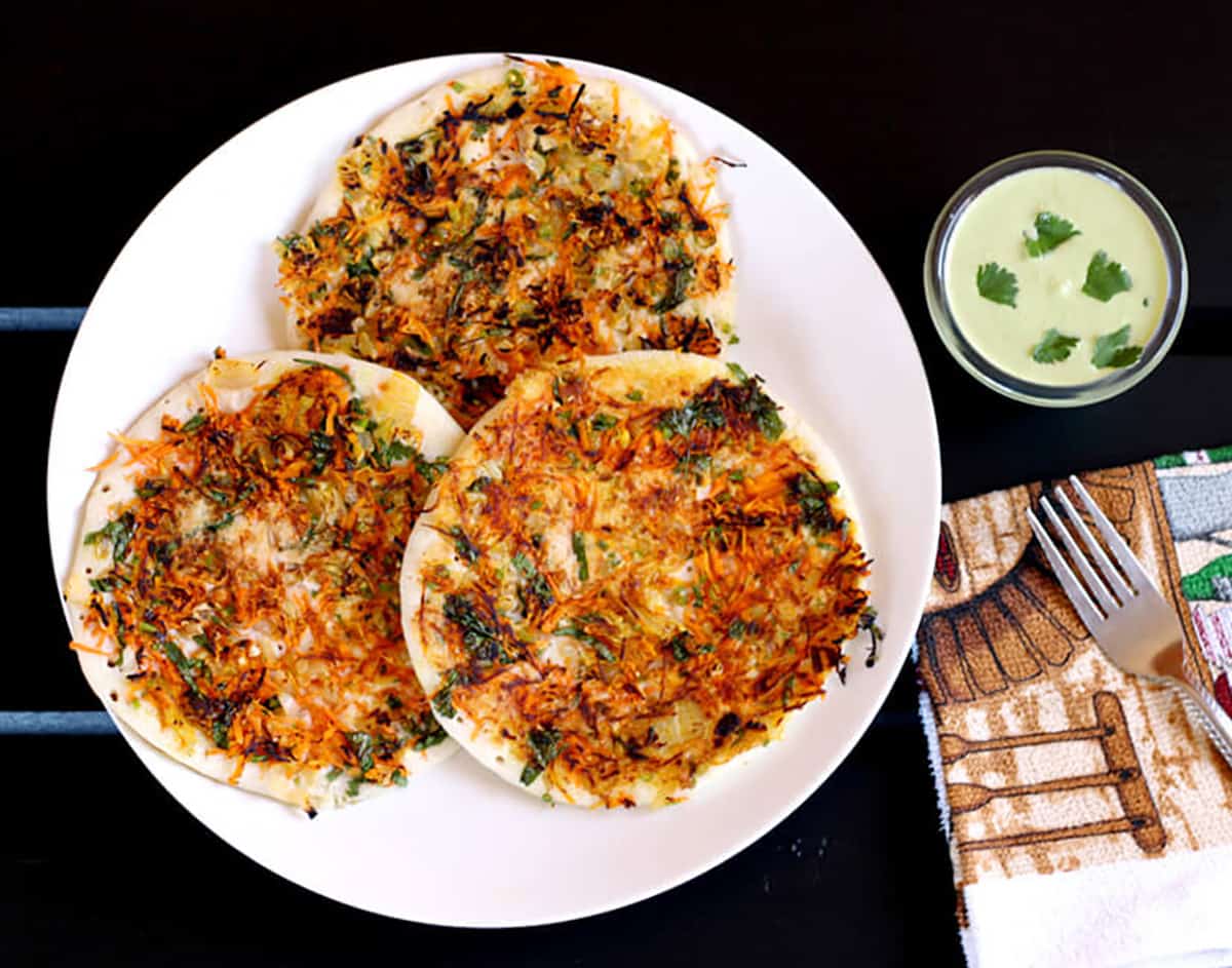 3 vegetable uttappa served with green coconut chutney 