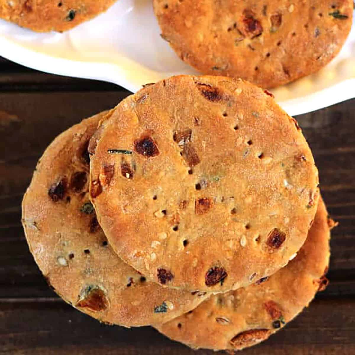 Spicy Onion Crackers Recipe | Baked Nippattu - Best evening snack or party appetizer.