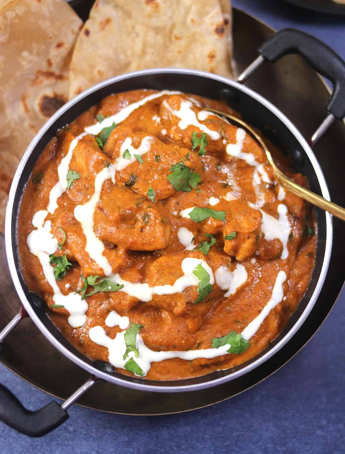 Creamy and easy butter chicken masala (murgh makhani restaurant style) with naan, roti. 