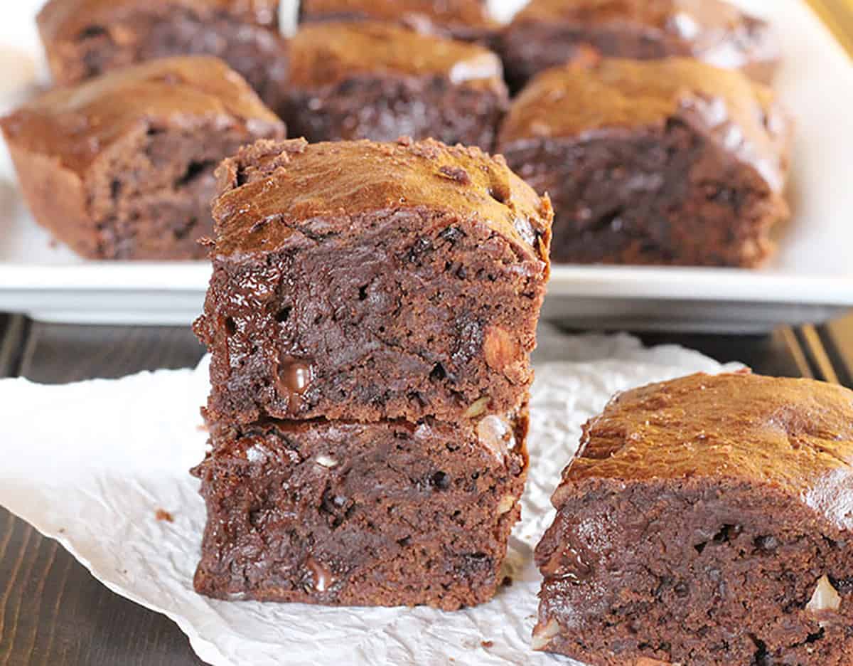 Stack of fudgy, chewy and double chocolate best homemade brownies