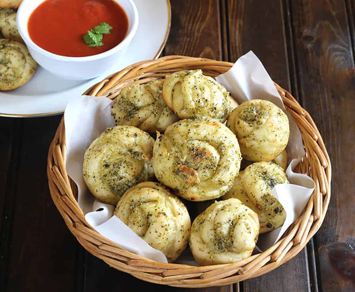 Top view of basket full of easy soft garlic knots 