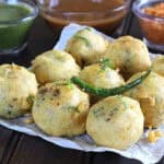 Best batata vada - street-style, crispy aloo bonda, potato dumplings - popular Indian snack recipe.