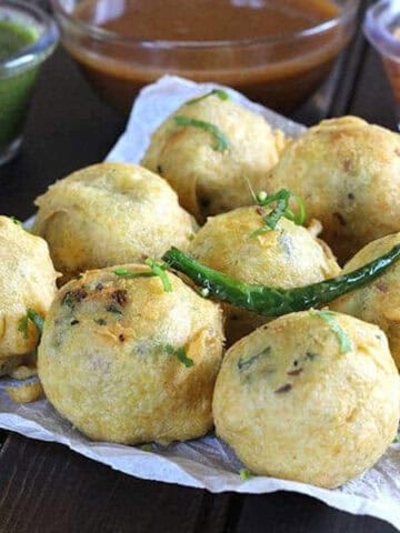 Best batata vada - street-style, crispy aloo bonda, potato dumplings - popular Indian snack recipe.