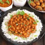Chickpea Tikka Masala | Chole Curry - Plant-based protein-packed recipe served with rice, naan, roti.