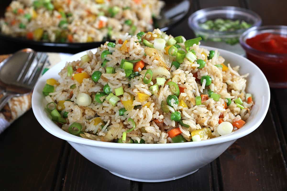 Bowl of simple, healthy, and easy vegetable fried rice (Chinese fried rice restaurant style).