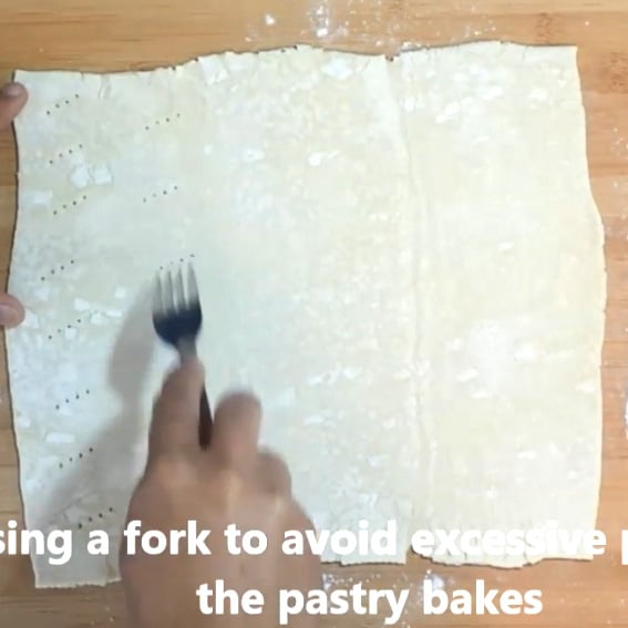 Prick puff pastry sheet to avoid puffing. 