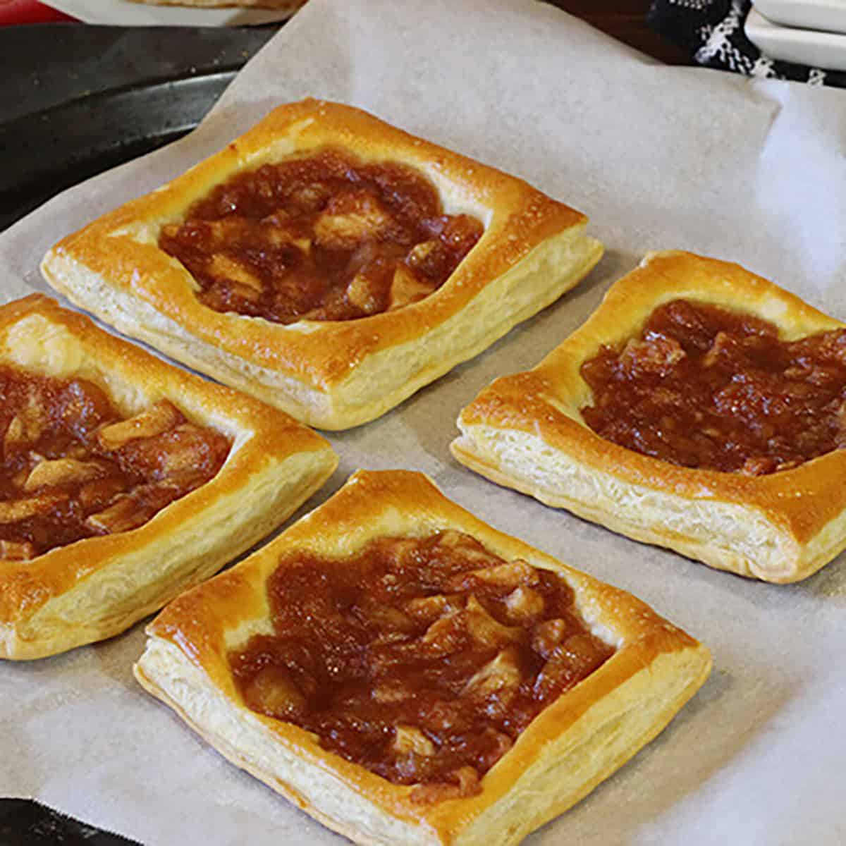 Place the pastry squares on baking sheet and bake. 
