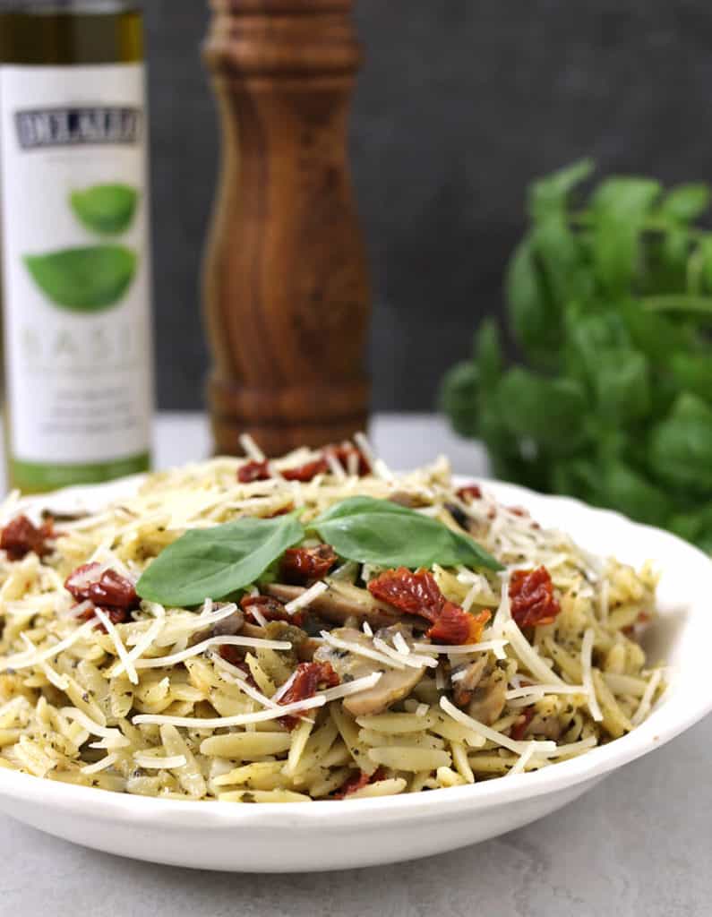 Orzo with pesto and sun dried tomatoes, orzo side dish, creamy orzo, orzo recipes , pesto pasta, basil pesto, weeknight and weekend dinner or meal for small family or large crowd 