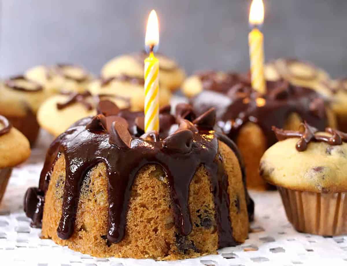 Easy and super moist chocolate chip bundt cake with chocolate glaze (ganache) .