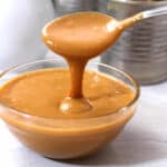 Best Dulce de Leche. Pouring homemade Dulce de Leche sauce.
