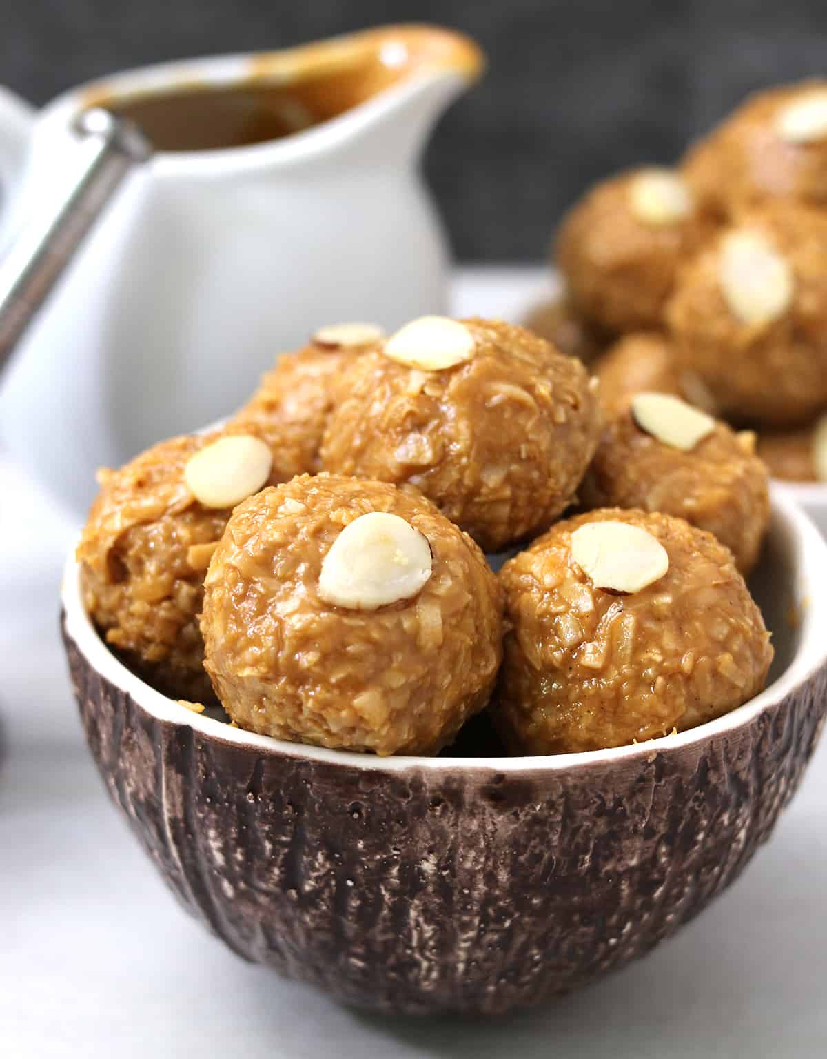Caramel coconut balls or coconut laddu - best coconut sweets desserts recipe. 