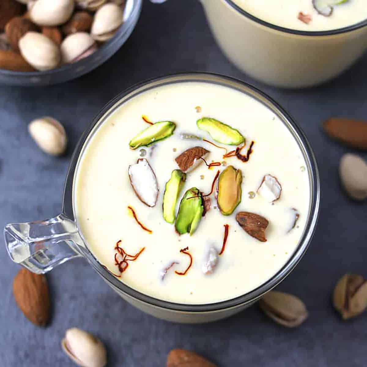 Basundi sweet - Best, quick and easy Indian milk dessert garnished with nuts, kesar. 