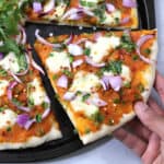 Best Indian Pizza, Homemade desi-style pav bhaji pizza topped with masala, mozzarella, coriander.