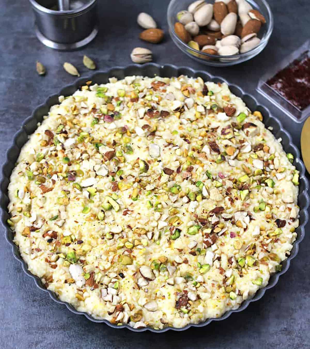 Simple and best Indian kalakand sweet (Indian milk cake or cheesecake) garnished with nuts. 