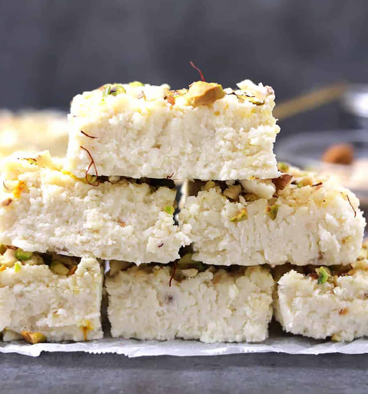 Stack of Indian kalakand mithai (Indian dessert made with paneer or ricotta cheese). 