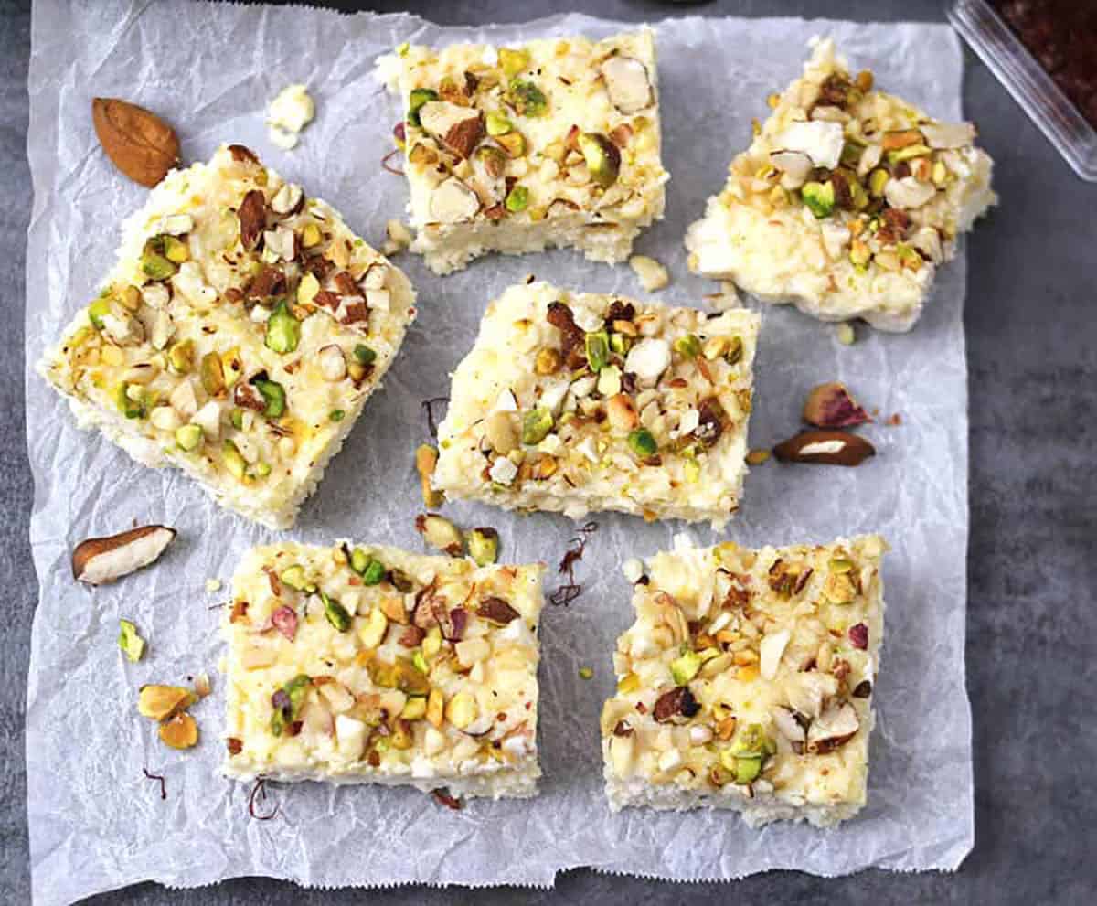 Best Indian kalakand sweet slices (Indian milk cake) on parchment paper. 