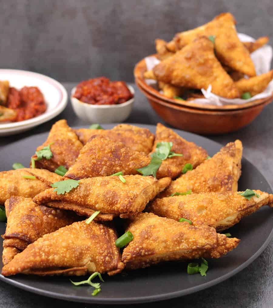 Schezwan Samosa / Gluten Free Appetizer / Vegan Appetizer / Indian Samosa / Samosa using spring roll wrapper / how to fold samosa / spicy samosa / chinese samosa / mini samosa / thanksgiving recipes / Diwali recipes / holiday recipes / new year recipes / super bowl recipe / gamenight recipe / party appetizer / chefyaki / twin dragon