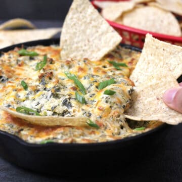 easy and best hot spinach artichoke dip with tortilla chips.