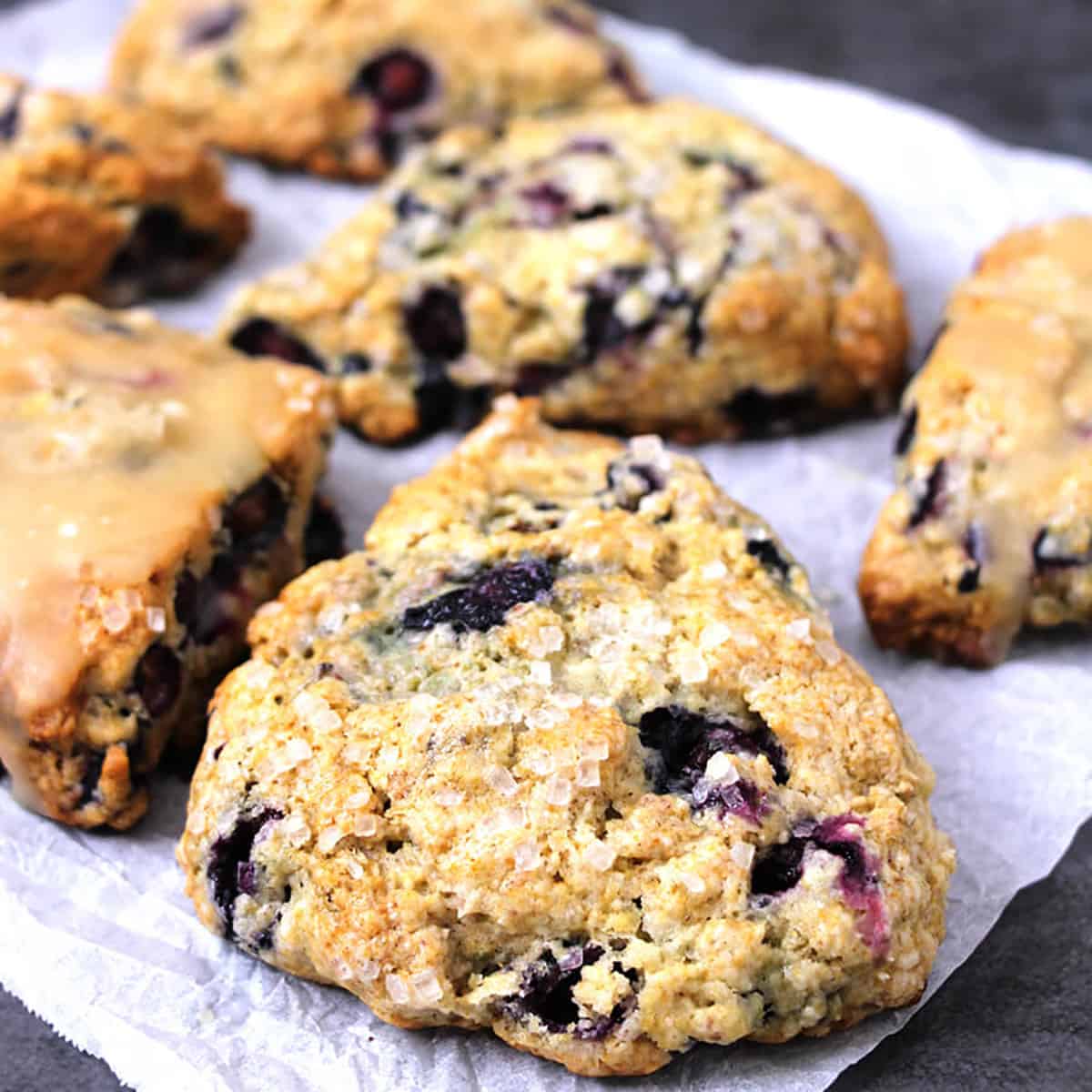 Plain traditional basic blueberry scones sprinkled with coarse sugar. 