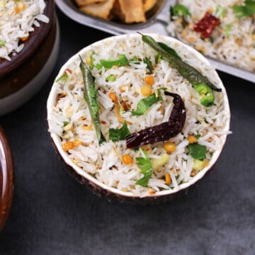 Best Indian coconut rice (thengai sadam) with basmati rice, tempering and coconut flakes.