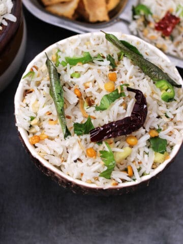 Best Indian coconut rice (thengai sadam) with basmati rice, tempering and coconut flakes.