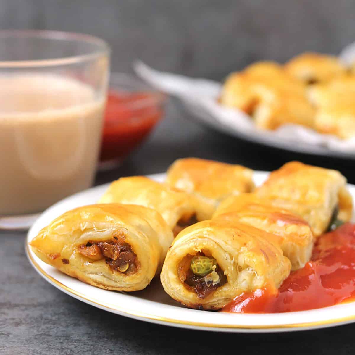 best bakery-style veggie puff pastry served with Indian masala tea (hot chai) & ketchup. 