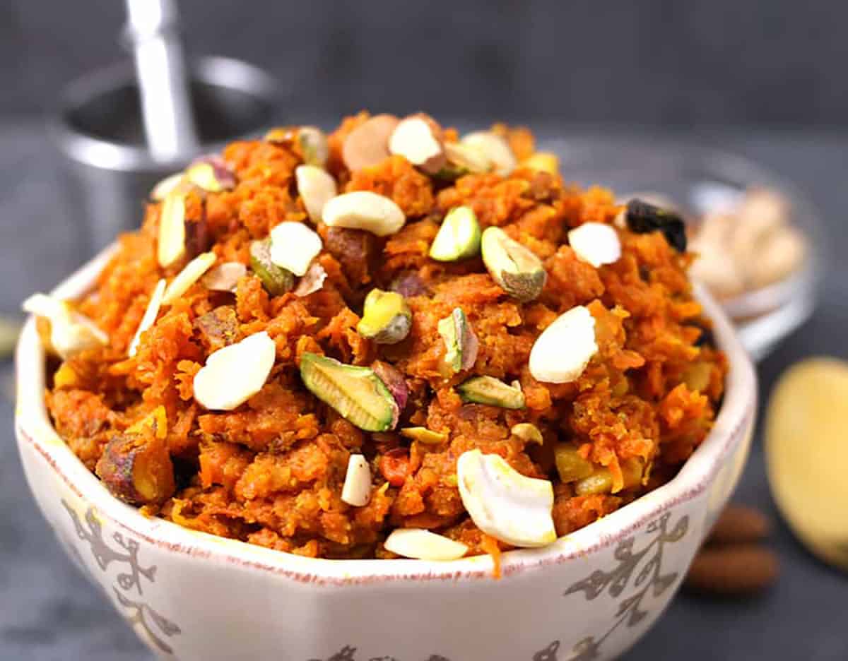close up view of traditional indian pudding dessert, carrot halwa recipe 