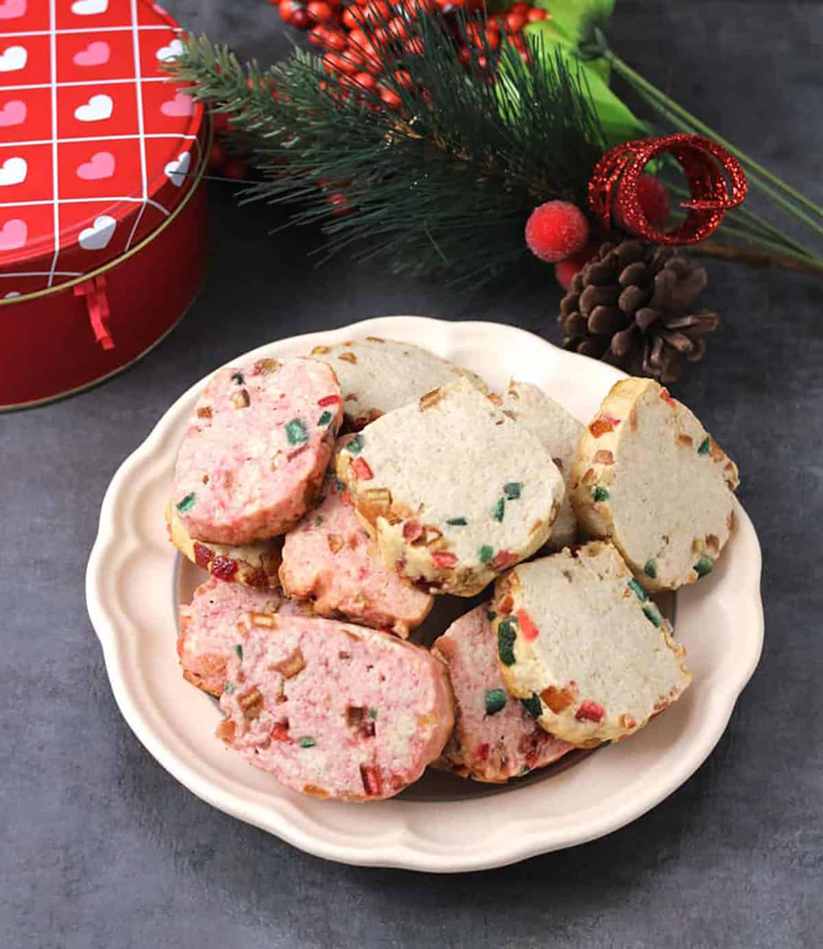 a plateful of unique holiday cookies with candied fruits (tutti frutti), rose and vanilla