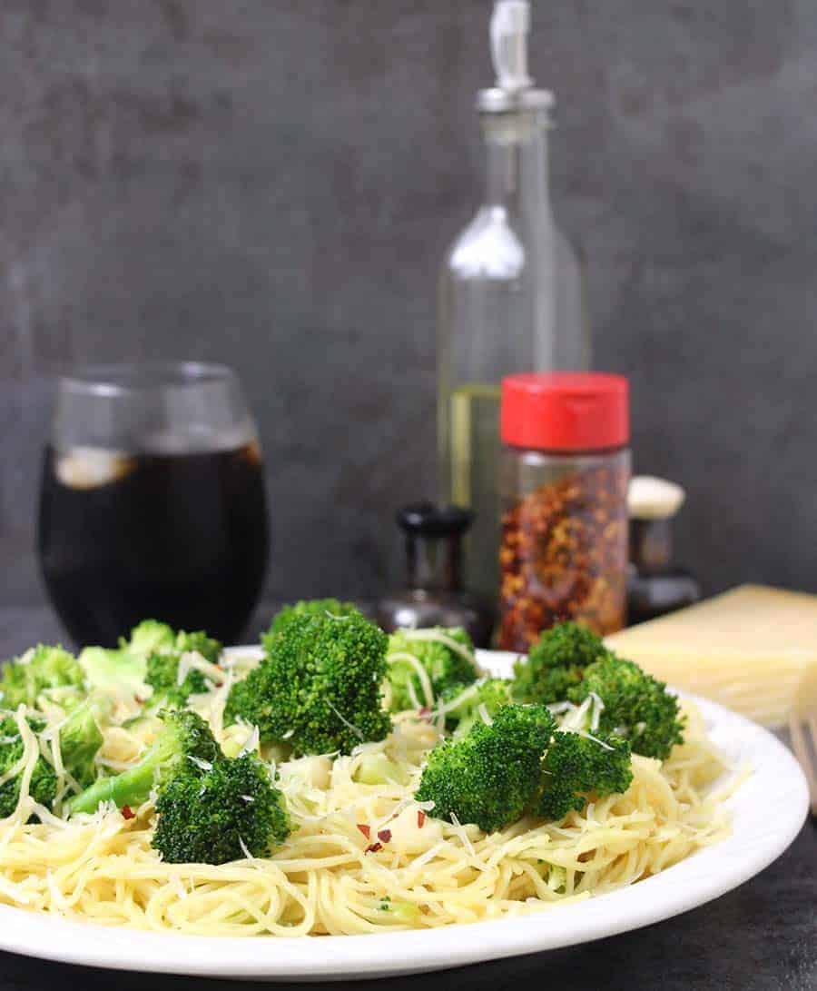 Healthy pasta for a quick dinner made with broccoli, garlic, oil, butter, and angel hair. 