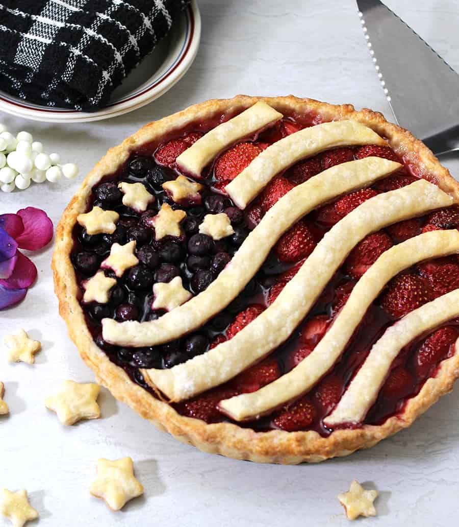 Patriotic Mixed Berry Pie, American Flag Pie, Red white and blue, Summer desserts, Flaky and Buttery  Homemade Pie Crust, 4th of july recipes, #strawberrypie #mixedberrypie #frozenberrypie #tripleberrypie #americanpie #piecrust #Piedough #redwhiteandblue, #veganpie 