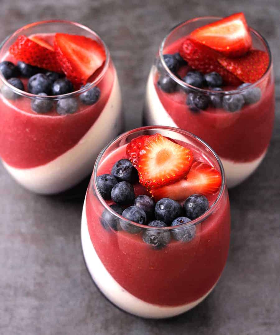 Strawberry and Blueberry Panna Cotta - Easy Red white and Blue Patriotic jello Dessert for Independence Day, 4th of july desserts, #strawberries #blueberries #summerdessert #4thofjulyfood #redwhiteandbluedesserts #independenceday #italiandessert #americanflagdessert #memorialdayrecipes #christmas #thanksgiving #nobakedesserts #makeahead