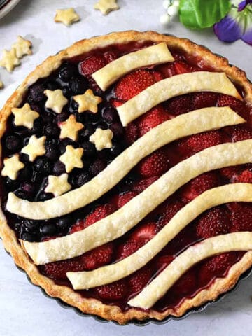 Mixed berry pie or American flag pie with stars and stripes.