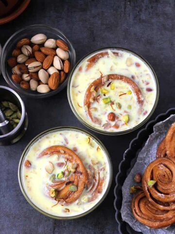 Homemade almond milk or badam milk, popular, easy Indian sweets or desserts for holiday, diwali, navratri, holi, karwa chauth, eid, christmas, phenori, chiroti, jalebi