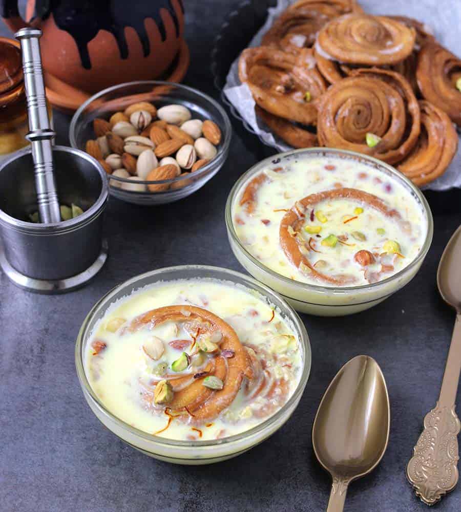 Homemade Badam Milk or Almond Milk, phenori, chiroti, balushahi, badusha, jalebi, rasmalai, best, popular, easy Indian sweets and desserts recipes for diwali, navratri, holi, ram navami, christmas, eid