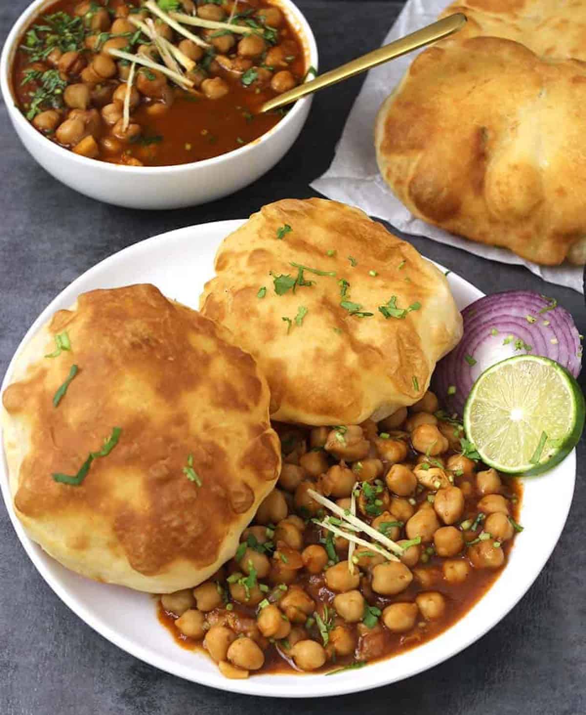 Punjabi Bhatura Recipe | Best, Soft and Fluffy Bhature served with chole (chana masala).