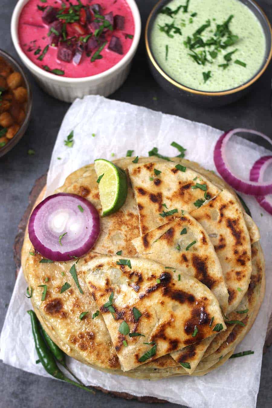 Aloo Paratha, How to make Paratha, Aloo naan, Indian flatbread recipes, vegan and vegetarian breakfast, lunch, dinner recipes, malabar parotta, bread stuffing, dhaba style, restaurant style, punjabi paratha, leftover mashed potato recipes, no yeast flatbread, #naan #roti #paratha, farata 