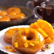 Mango Doughnuts (Donuts) with Mango Glaze, How to make best homemade doughnuts #doughnuts #donuts #glaze #icing #frosting, mango recipes, summer breakfast and desserts, yeast donuts, glazed donuts, vegan donuts, holiday breakfast and dessert, air fryer donuts, baked donuts, instant pot recipes, mango recipes, holiday breakfast ideas