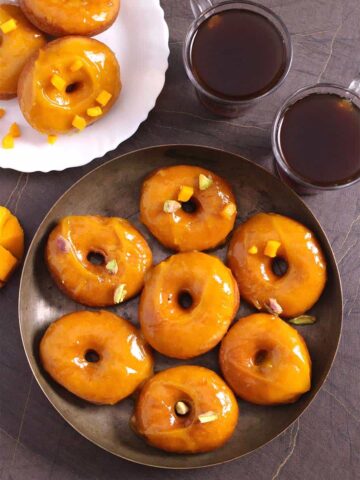 Mango Doughnuts (Donuts) with Mango Glaze, How to make best homemade doughnuts #doughnuts #donuts #glaze #icing #frosting, mango recipes, summer breakfast and desserts, yeast donuts, glazed donuts, vegan donuts, holiday breakfast and dessert, air fryer donuts, baked donuts, instant pot recipes, mango recipes, holiday breakfast