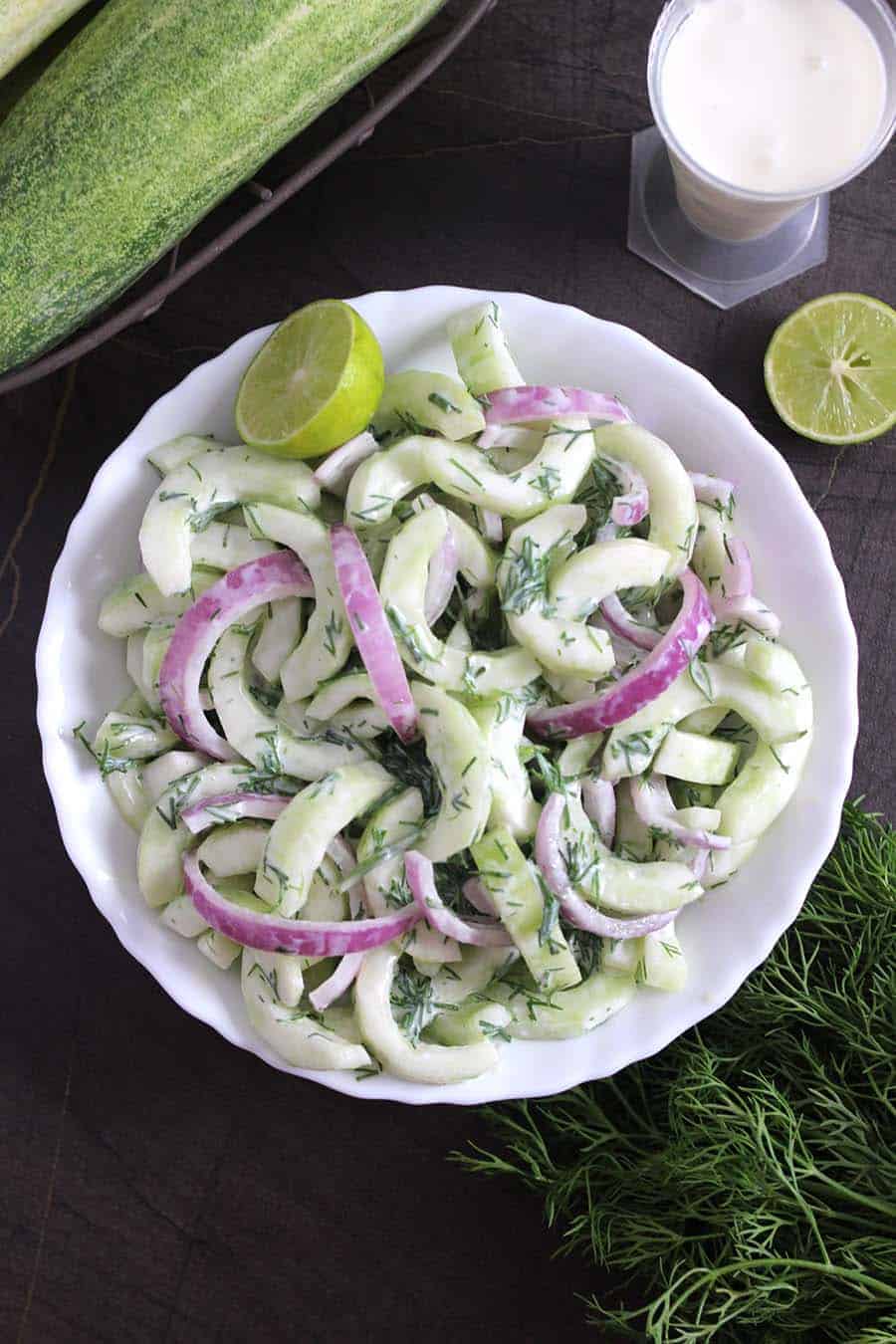 Best & Easy, Healthy & SImple, Creamy Dill Cucumber Salad, German Cucumber Salad, Gurkensalat, Yogurt or sour cream salad dressing, side dishes for lunch and dinner #salad #saladrecipes #saladdressing #healthysalad #summersalad #bbqrecipes #Potluck #Picnic #ketocucumbersalad #kakdi