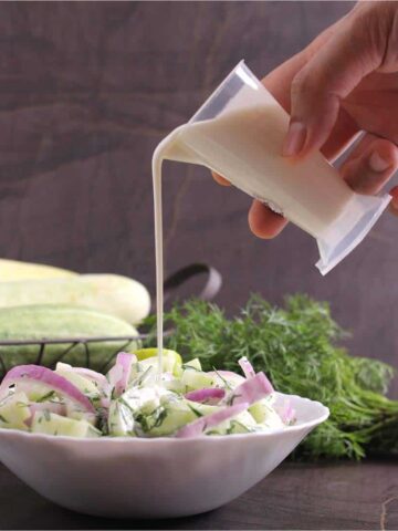 Best & Easy, Healthy & SImple, Creamy Dill Cucumber Salad, German Cucumber Salad, Gurkensalat, Yogurt or sour cream salad dressing, side dishes for lunch and dinner #salad #saladrecipes #saladdressing #healthysalad #summersalad #bbqrecipes #Potluck #Picnic #ketocucumbersalad