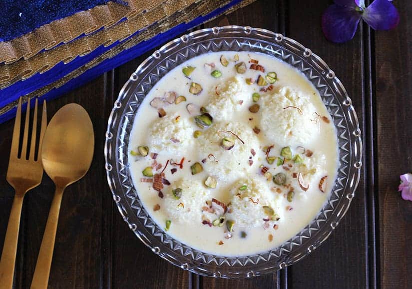 Rasmalai - Popular Bengali sweets from India, Rasgulla, Paneer sweets recipe, ricotta cheese, sweets, mithai, desserts for Diwali, Holi, Eid, Christmas, thanksgiving, Milk Based sweets #indiansweets #rasmalai #rasgulla #homemade #softrasgulla #rabri #rabdi 
