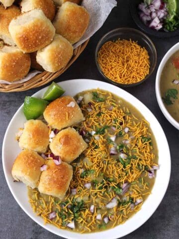 Misal pav, Usal Pav, maharashtrian, mumbai street food, breakfast, snack and meal recipe, ladi pav bun, Indian dinner rolls, spicy kolhapuri, pune, nashik recipe, sprouts or lentil curry, #indianrecipes #Misalpav #pav #bun #dinnerrolls #Misal #usal #greenpeas #sprouts