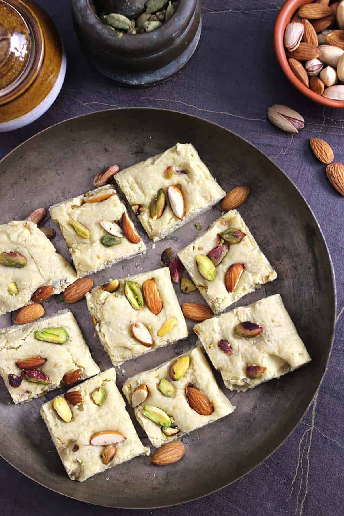 7 cups sweet, seven cup burfi on brass plate ready to be served for Diwali