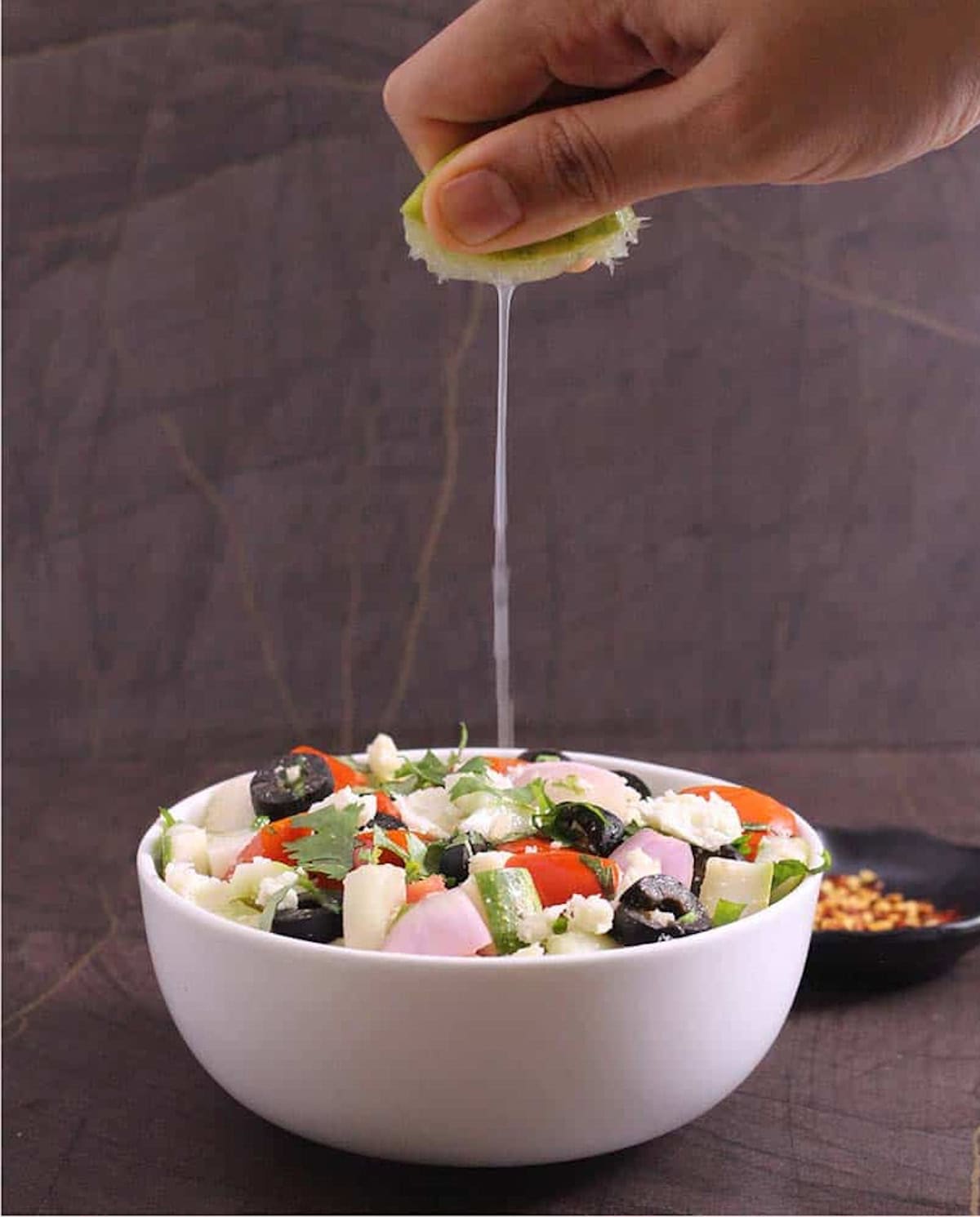 Bowl of Greek Salad Recipe with olive oil dressing | Salad with Fresh Vegetables.